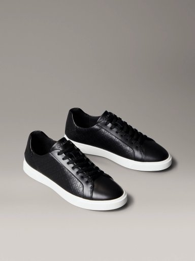 ZAPATILLAS CON MONOGRAMA EN RELIEVE - 1