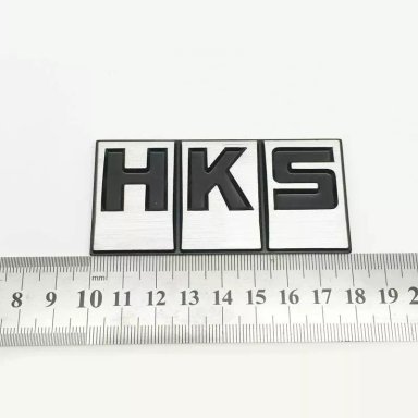 EMBLEMA PEGATINA ADHESIVO METÁLICO MODELO HKS LETRA NEGRA - 1