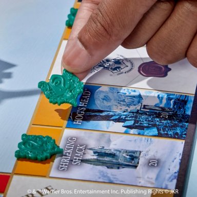 JUEGO DE MESA MONOPOLY HARRY POTTER - 14