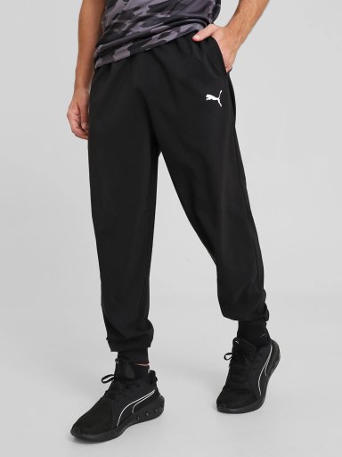 PANTALÓN DE BUZO HOMBRE PUMA 527045 NEGRO TRAIN ESS JOGGER - 1