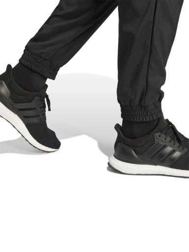 PANTALÓN DE BUZO HOMBRE ADIDAS JD1833 NEGRO ESSENTIALS SMALL LOGO STANFORD - 5