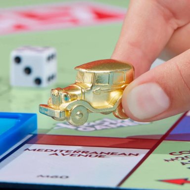 JUEGO DE MESA MONOPOLY EXPANSIÓN PARADA LIBRE: GRAN PREMIO - 11