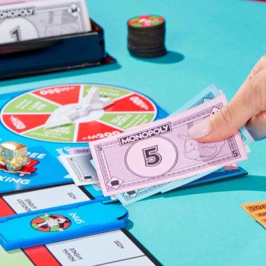 JUEGO DE MESA MONOPOLY EXPANSIÓN PARADA LIBRE: GRAN PREMIO - 14